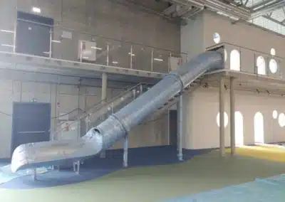 Evacuation tube slide, industrial hall
