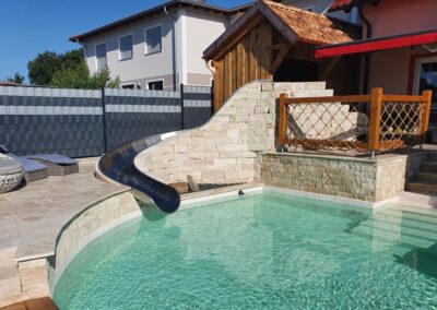 Water slide made of stainless steel, built in exterior.