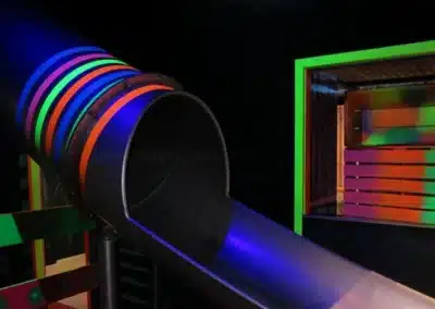 Colorful design on tunnel slide.